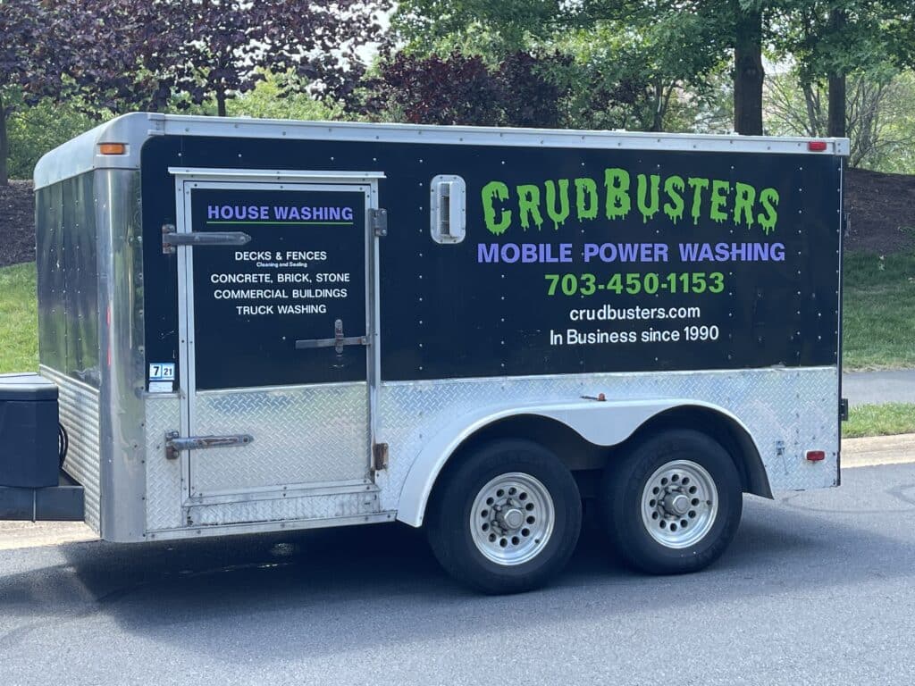 Crudbusters' pressure washing equipments inside a close van.
